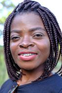 Young african Woman with tooth jewelry