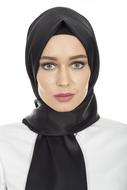 portrait of woman in black hijab