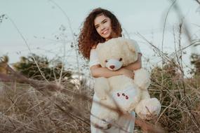 young woman with teddy