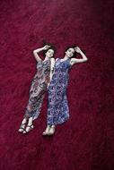 Twins Girls Sisters purple background
