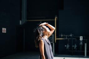 Profile portrait of the Chinese woman in light