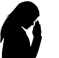 Black silhouette of a praying woman, at white background, on clipart