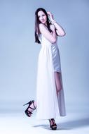 posing girl in a long dress