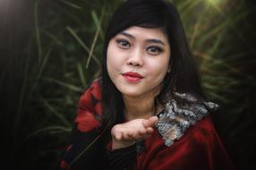 pretty asian Woman with open palm, Portrait