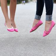 pink shoes on female feet