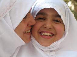 Mother and Daughter, two happy muslim women