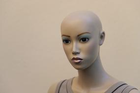 Portrait of a woman mannequin with colorful make-up