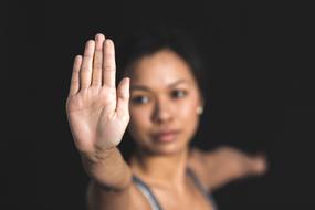 hand Girl close-up on blurred background