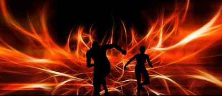 silhouette man woman fire