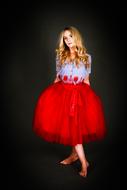 woman in red skirt