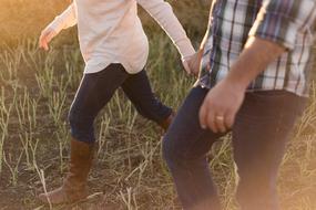 couple in love in the grass close up