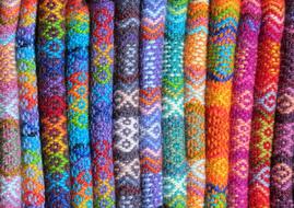 variety of colorful woolen textiles