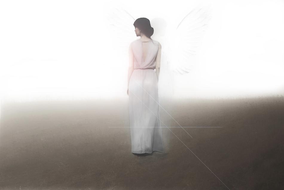 woman as an angel in bright light