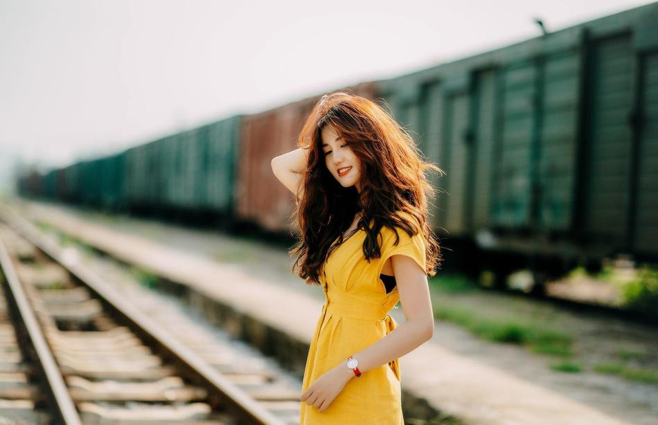 vietnamese girl on the railroad on blurred background