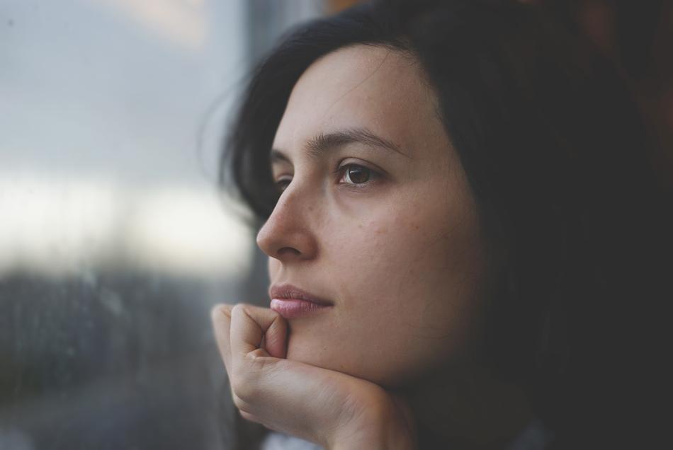 portrait of a girl in thought on a blurred background
