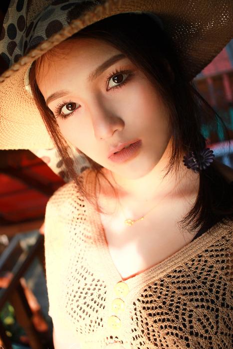Beautiful vintage woman with the sunhat