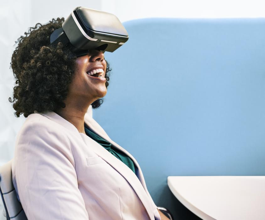 dark-skinned girl with virtual reality glasses