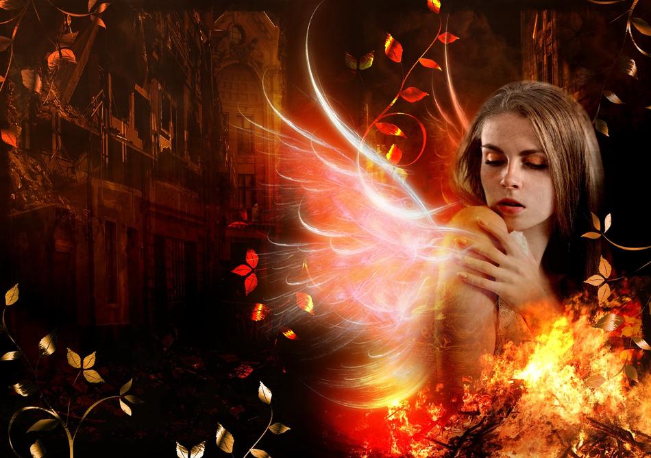 Portrait of the bare woman with colorful, fire wings