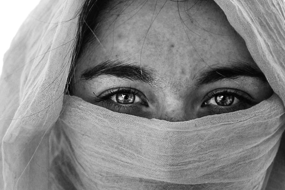 Beautiful oriental Woman with Headscarf