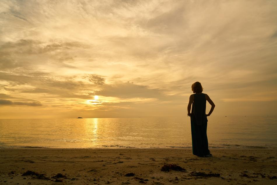 Woman Model on coast at Sunset