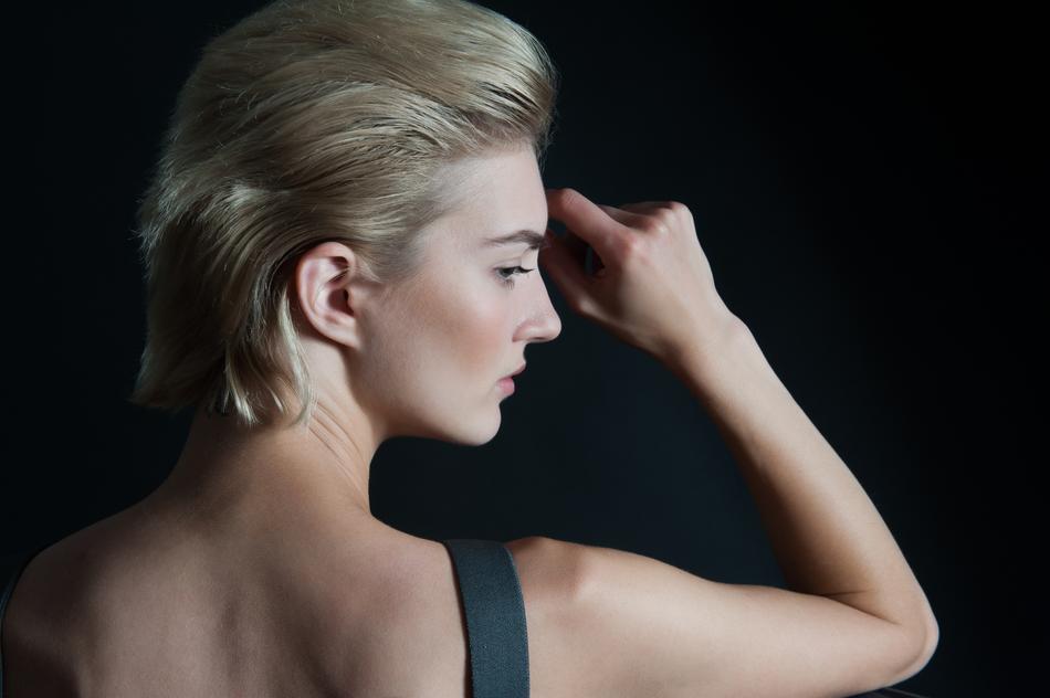 Portrait of the blonde woman with the fashionable hairstyle
