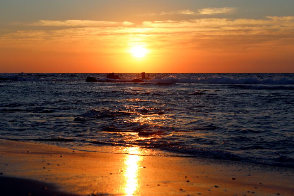 bright setting sun over the body