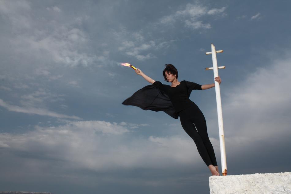 girl in black on the roof