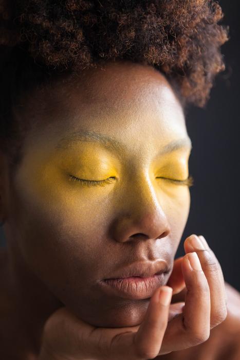 portrait of african american model with yellow eyes