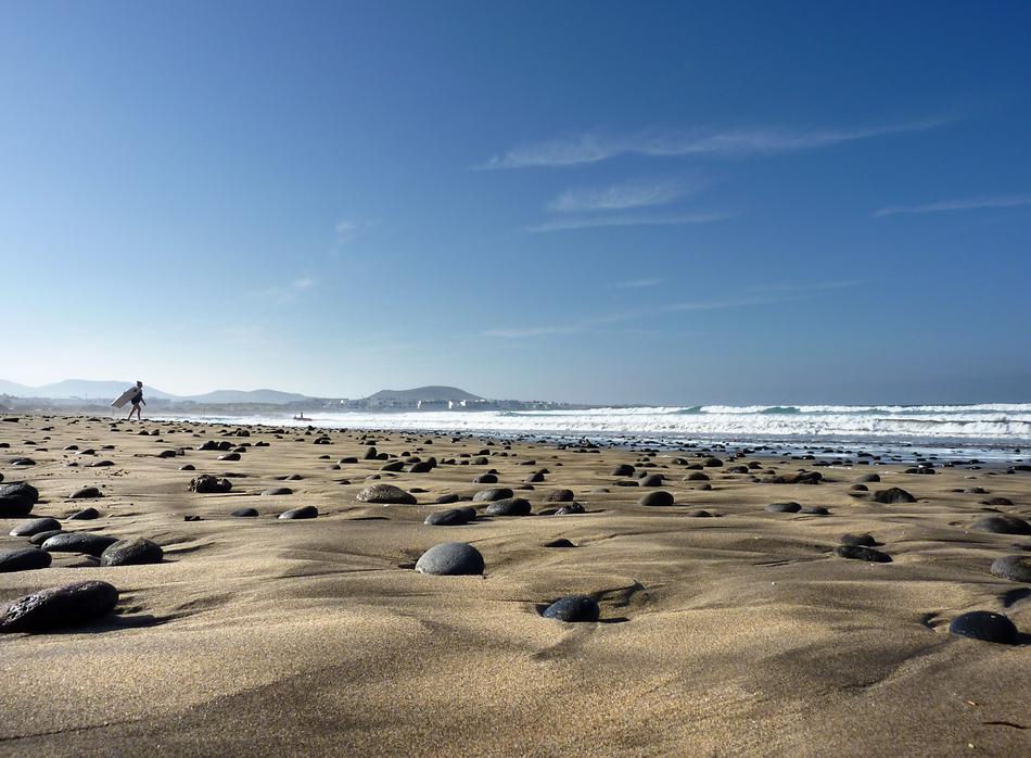sand and round stones by the sea