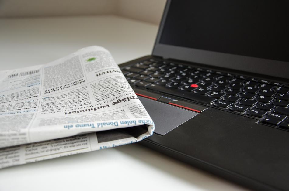 Newspaper on laptop Computer