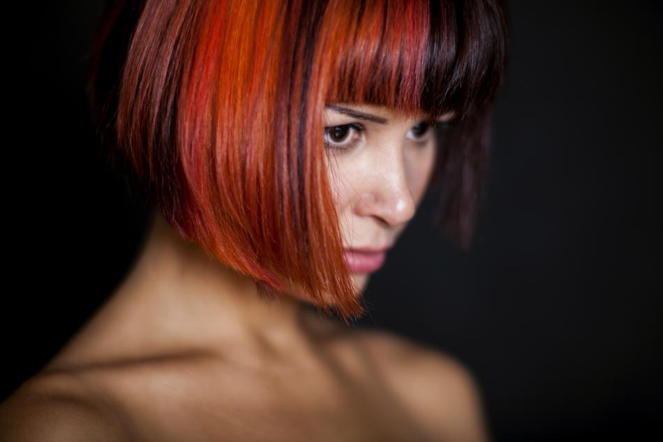 beautiful girl with shoulder-length red hair