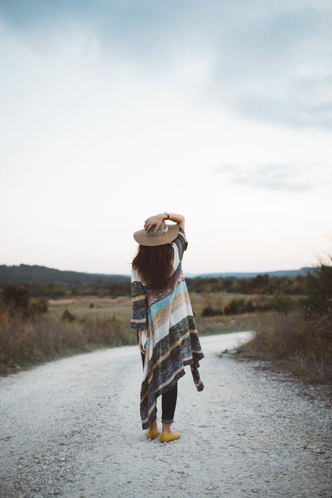 woman on gravel road in summer