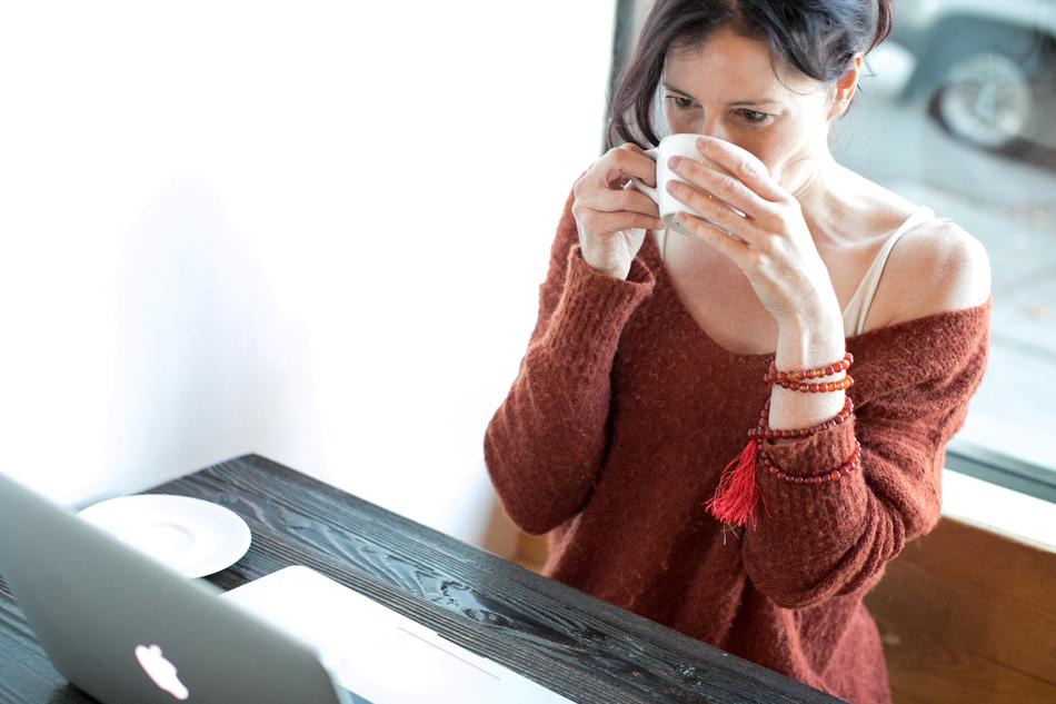 Woman with Coffee and macbook