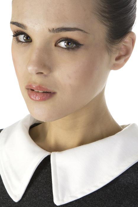 Beautiful Young Girl in black clothing with white collar