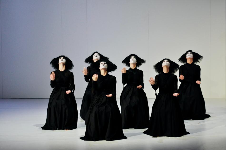 girls in black clothes dancing in the theater