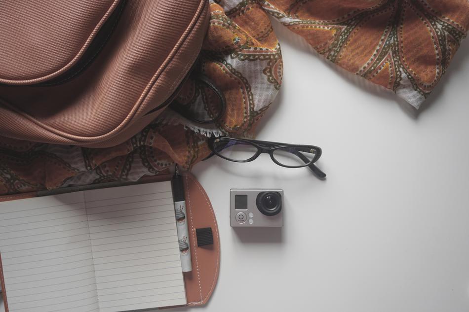 Fashion Glasses and Go Pro camera on desk