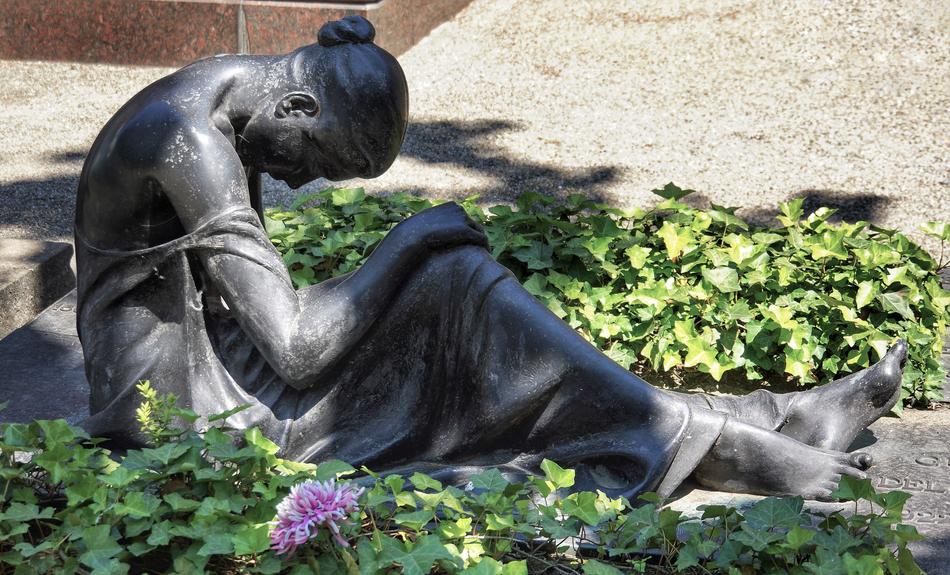 bronze sculpture at graveyard