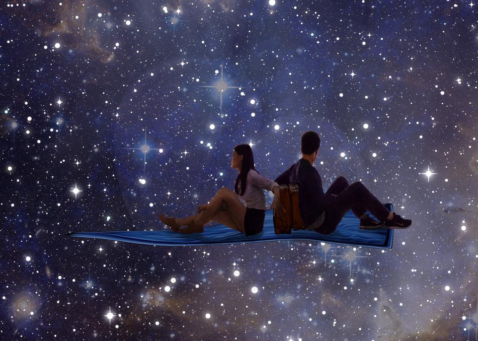 Young couple on colorful background with the stars