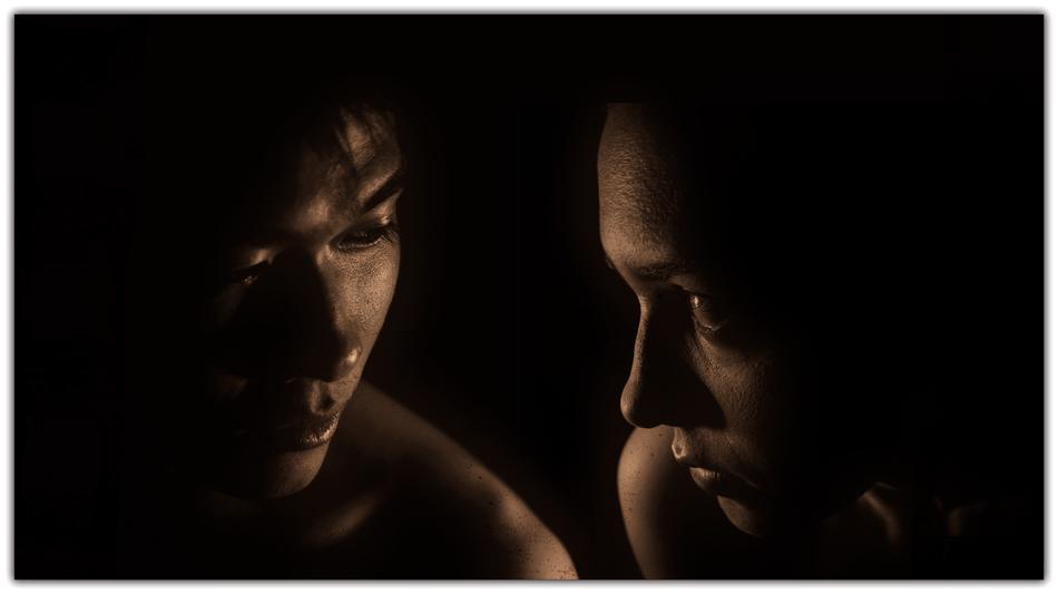 portrait of couple in darkness