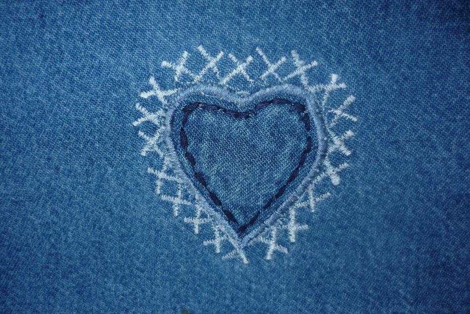 Beautiful, white and blue heart, with the pattern, on the jeans