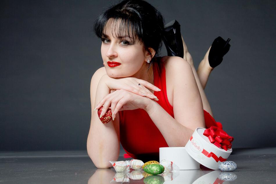 woman with box of sweets