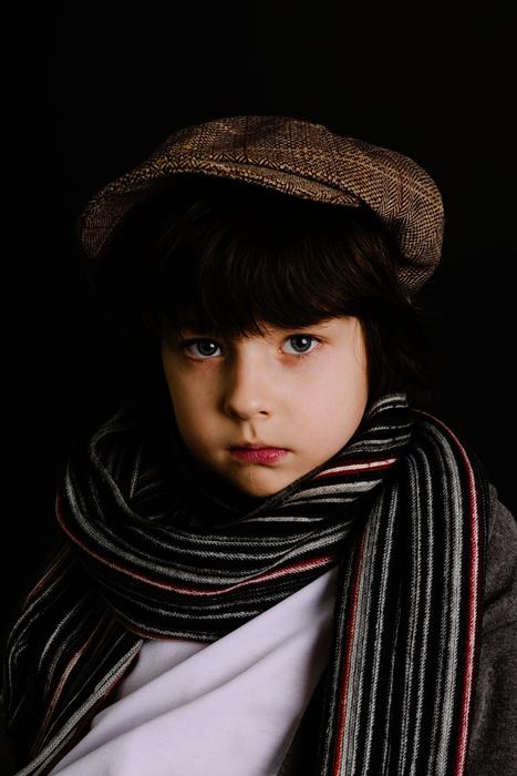 portrait of a boy in a scarf
