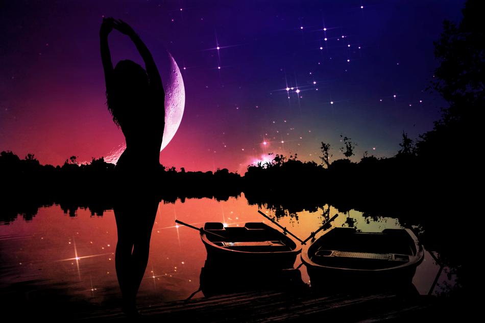 silhouette of a girl and fishing boats on the lake against the starry sky