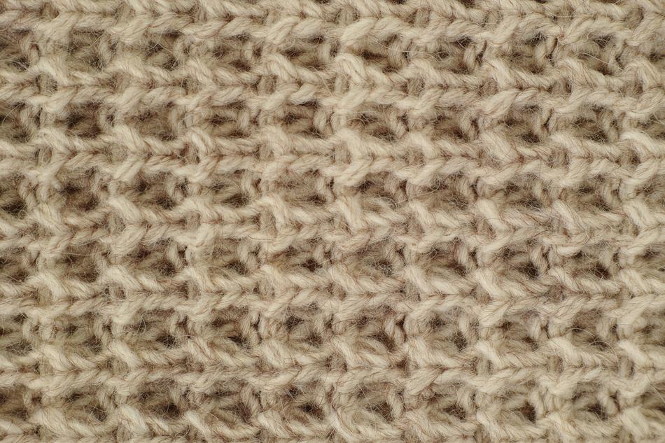 Тканый узор. Knitting background Beige.