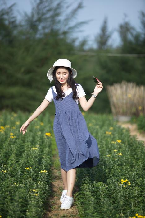 Girl And Watermelon in garden