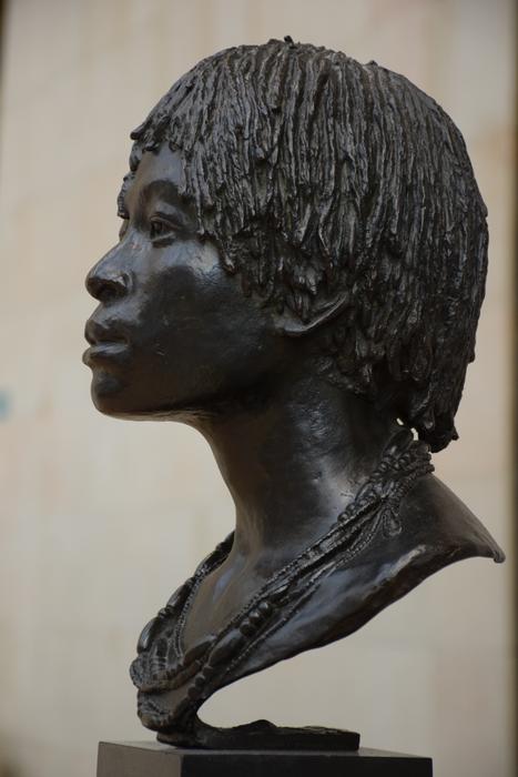 Beautiful, black head statue in Orsay, Paris, France