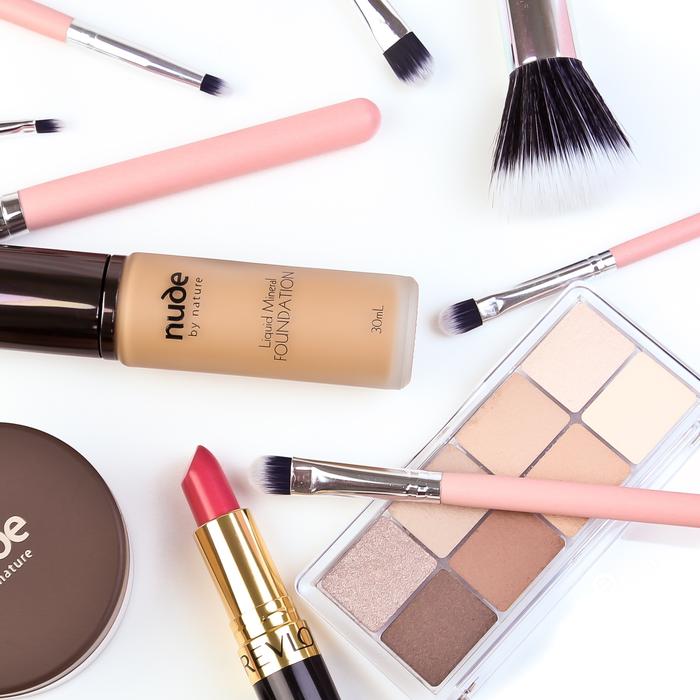 Variety of cosmetics on white background