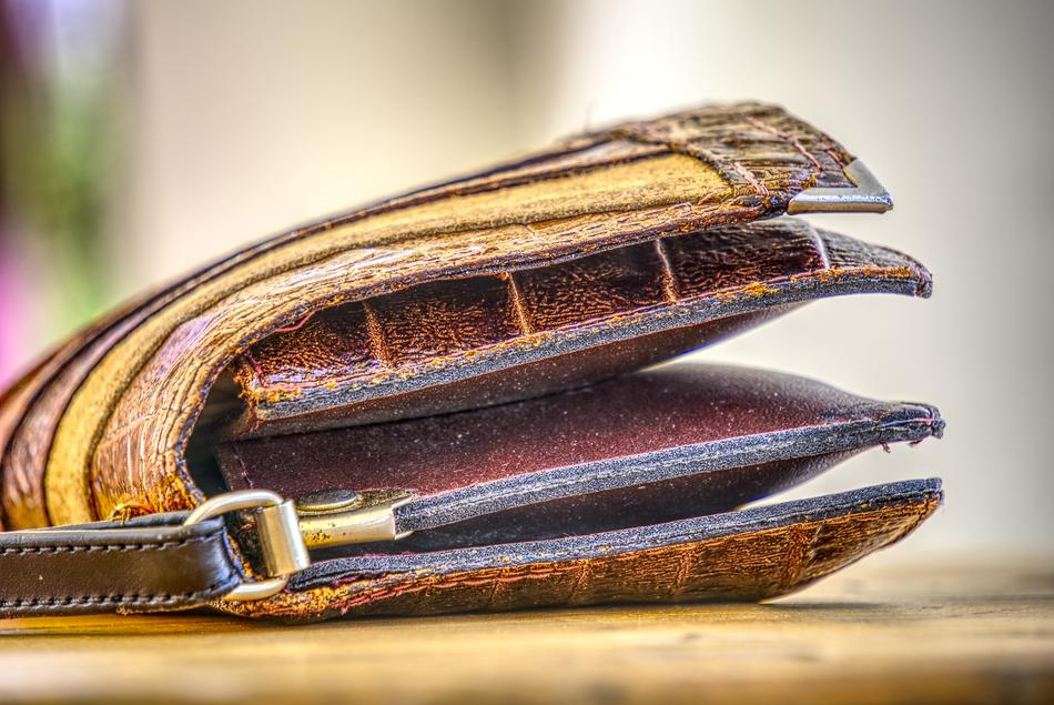 Close-up of the colorful and beautiful, leather handbag, at blurred background