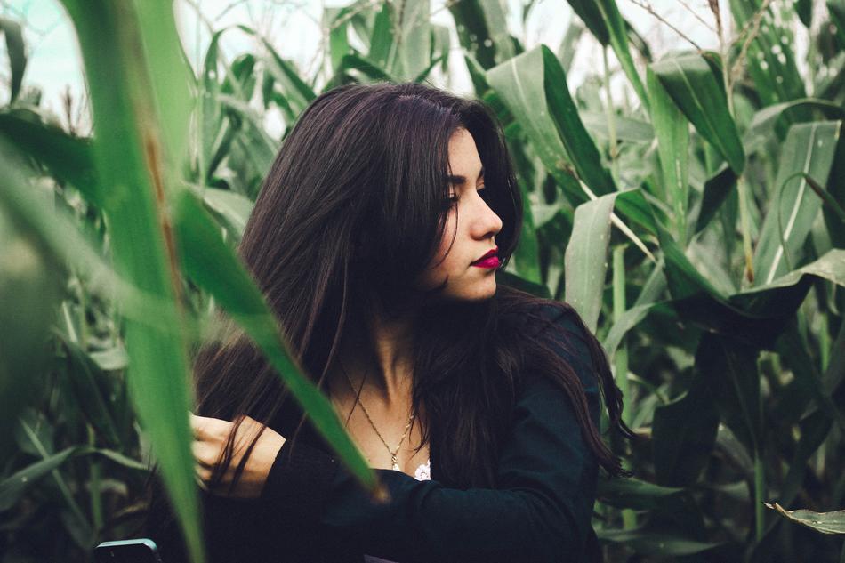 Beautiful girl Model in Corn Field