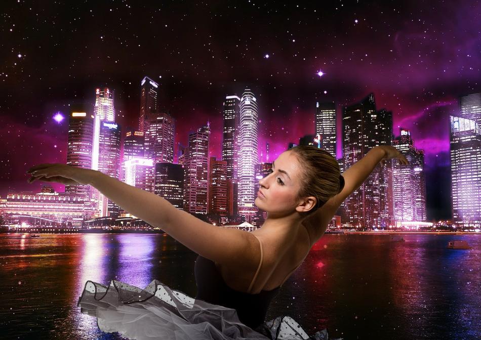 ballerina against the backdrop of the night city as digital art